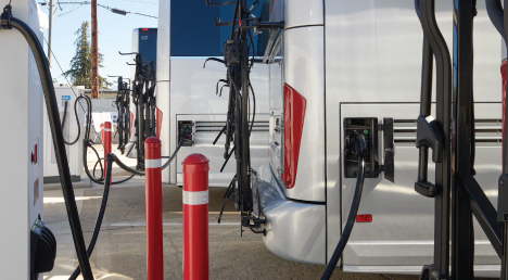 Electric Vehicles in a bus yard being charged