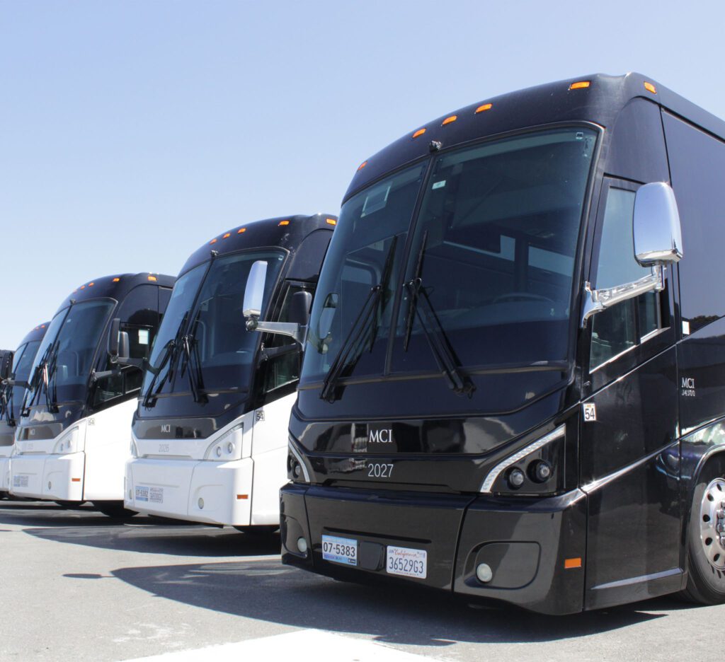 Multiple Hallcon busses lined up.