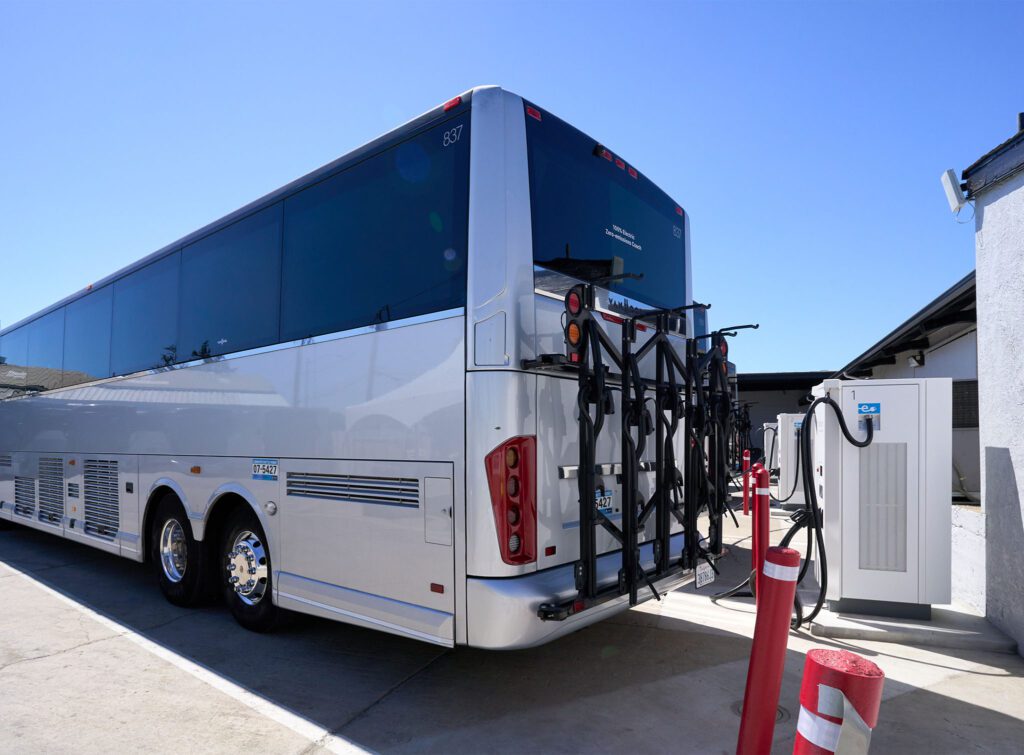 A Hallcon electric bus charges at the facility.