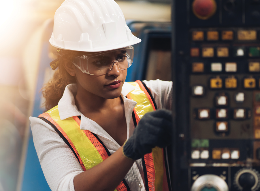 Rail technician working on train.