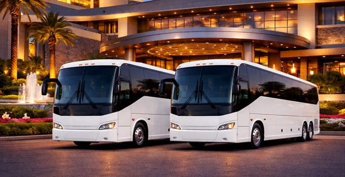 Two motorcoaches parked in front of a 5 star casino