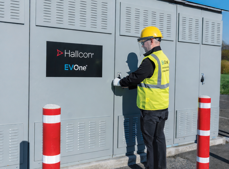 Hallcon EVOne® outsourced EV infrastructure management technician servicing switchgear