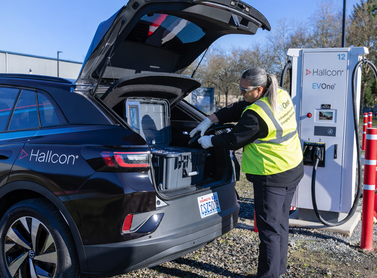 Hallcon EVOne® EV infrastructure technician performing preventative charger maintenance